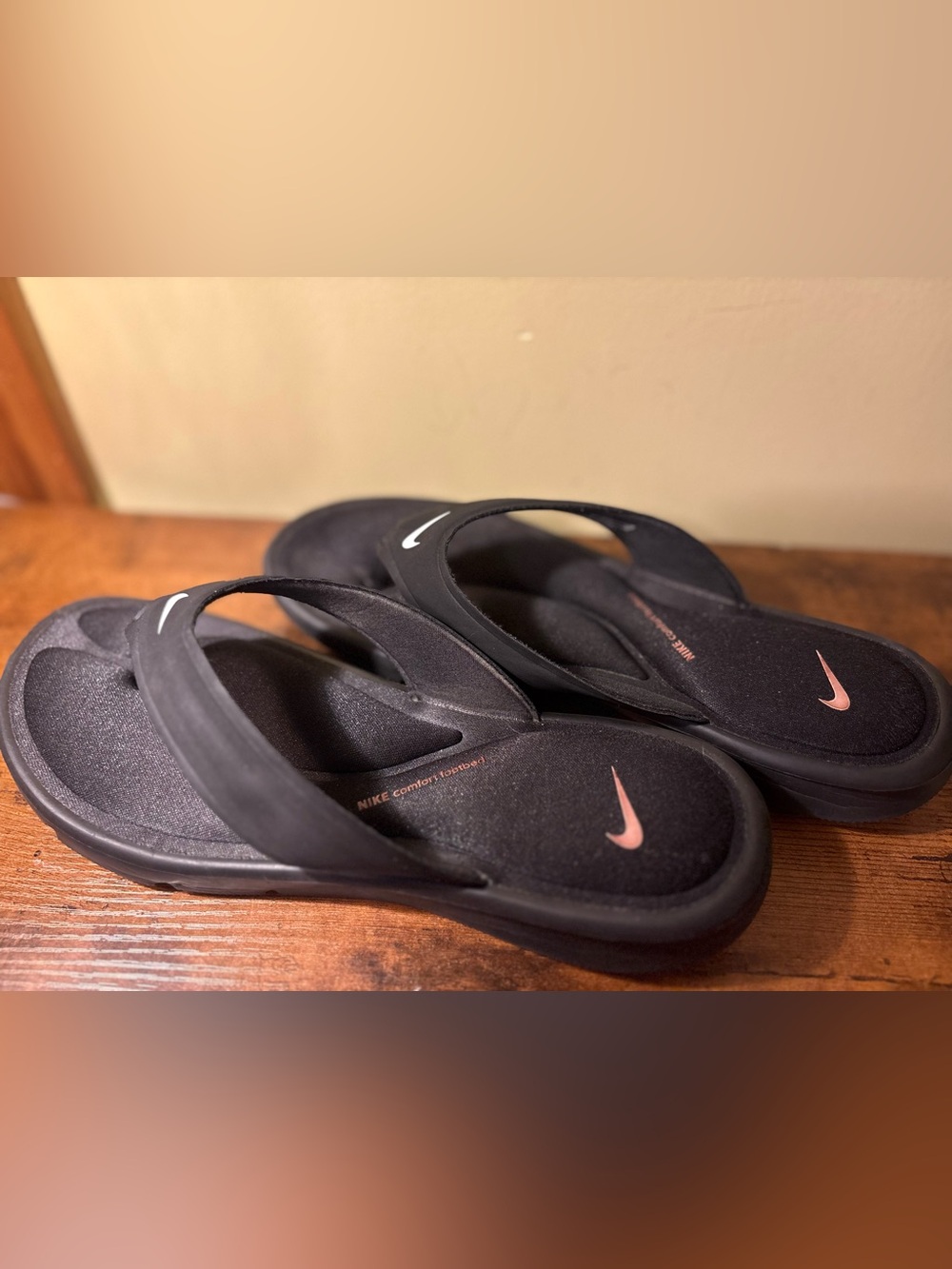 Nike Women's Black Flip Flop Sandals with Pink Swoosh
